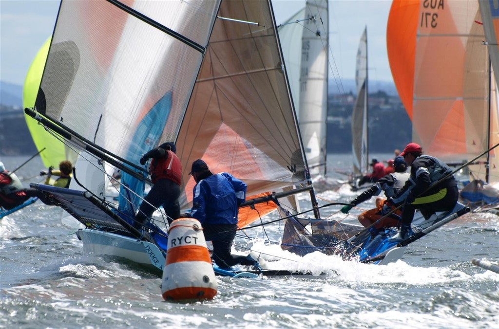 Dodge a Bullet dodges the buoy in tight racing around the buoys. - B14 World Championship Royal Yacht Club of Tasmania Hobart  © Jane Austin